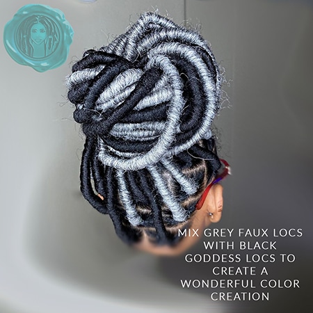 Black and grey crochet faux locs hair updo in a high faux locs bun