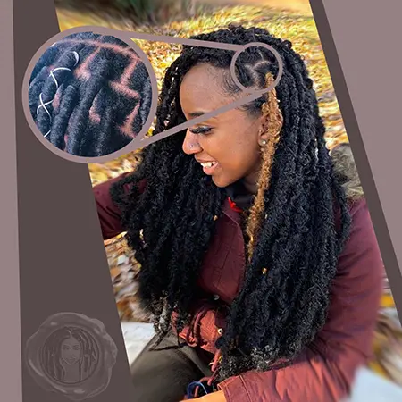 Young brown female wearing black and brown crochet faux locs hair extensions at the park with a burgundy jacket