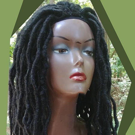 Wonderful and wild bohemian black dreadlocks wig in the forest of africa.