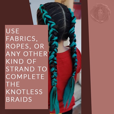 Young white girl with knotless box braids in her hair made with blue fabric for colorful hair design.