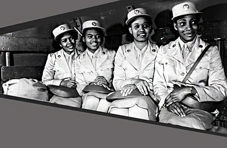 Four black women with bob bobbed hairstyles in world war 2 helping during the war wearing their clean and formal uniforms.
