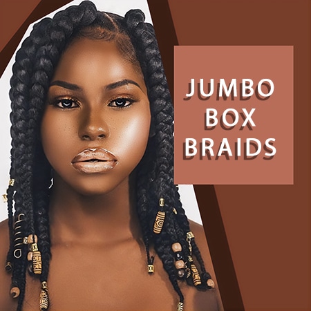 Brown skinned african girl with beaitufl skin and jumbo box braids.