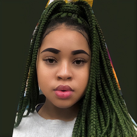 Light skin latino female with earthy green medium length box braid green hair color