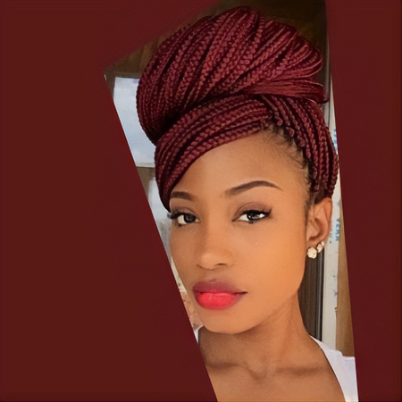 Sophisticated burgundy box braid hair color on african american woman.