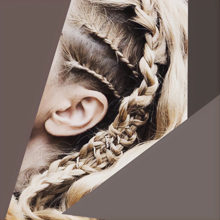 Very neat and sleek cornrow braids on side of the head in viking braided hairstyle.
