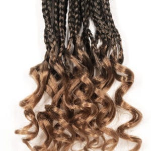 Honey blonde box braids 18 inches with zoomed in focus on the goddess hair tips that are curled professionally.