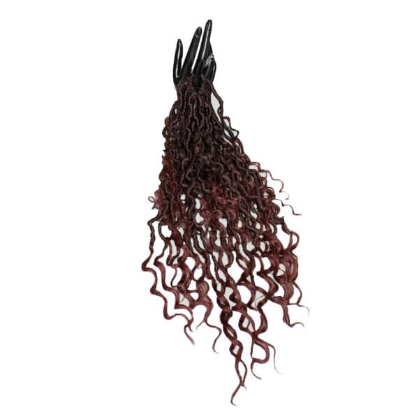 Deep wine burgundy crochet faux locs hair extensions on manikin hand with white background.